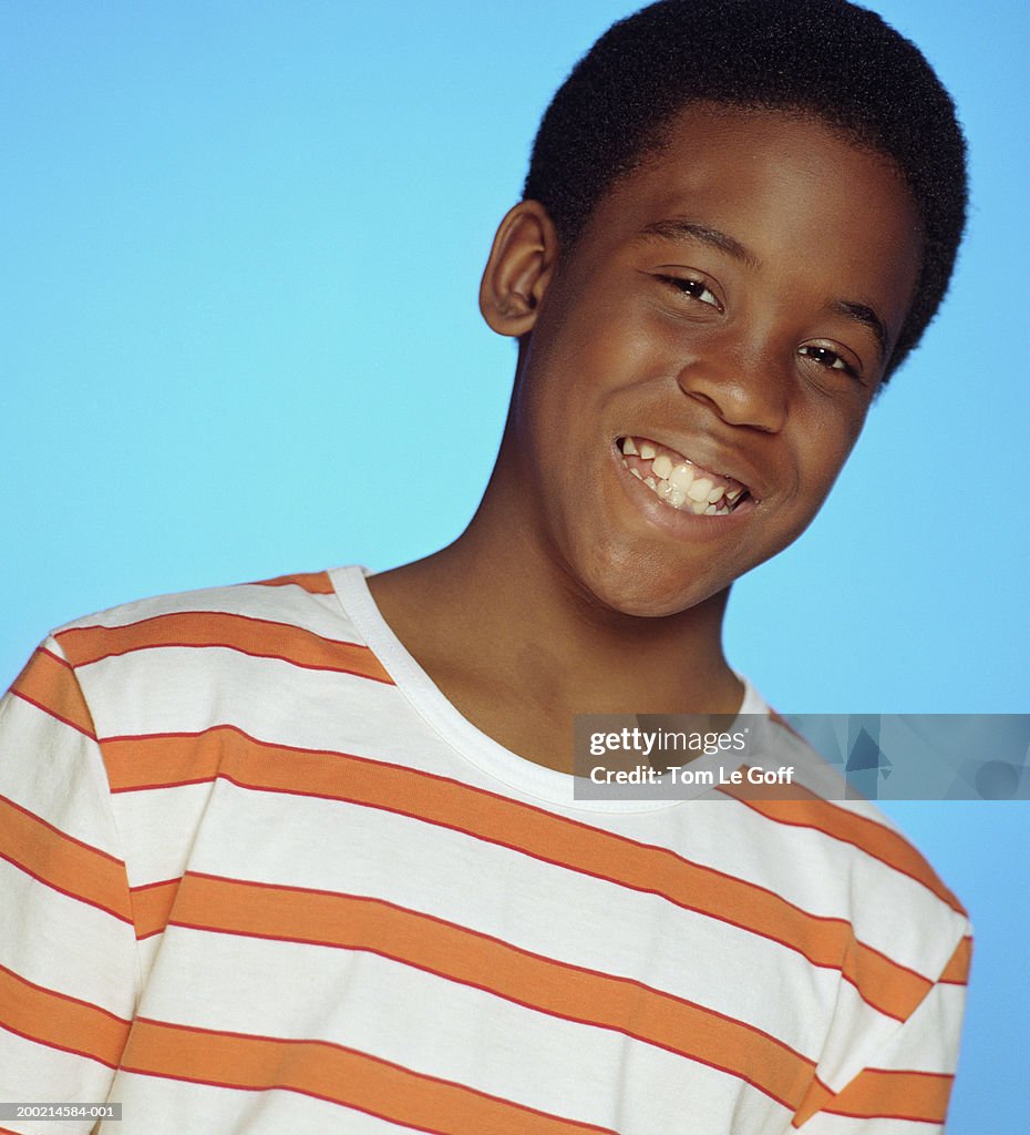 Boy (9-11) smiling, portrait, close-up