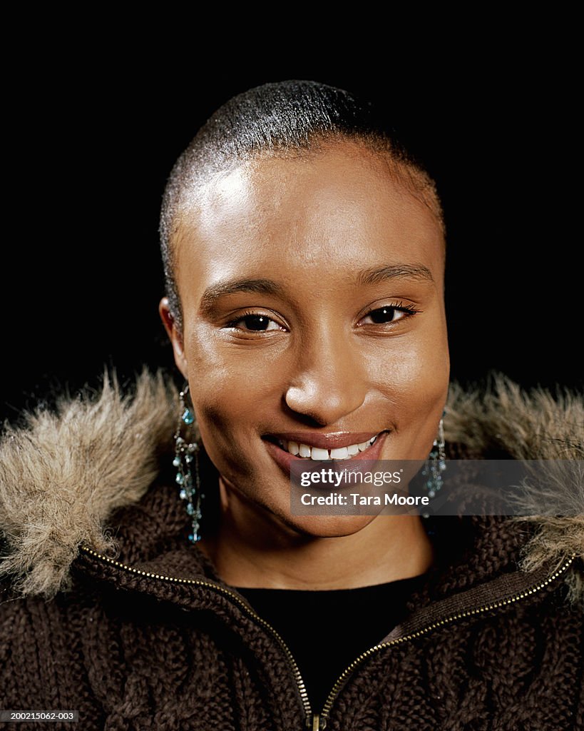 Young woman smiling, close-up