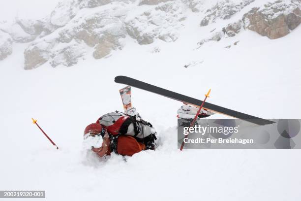 telemark skier in snow after fall - ski pole stock pictures, royalty-free photos & images