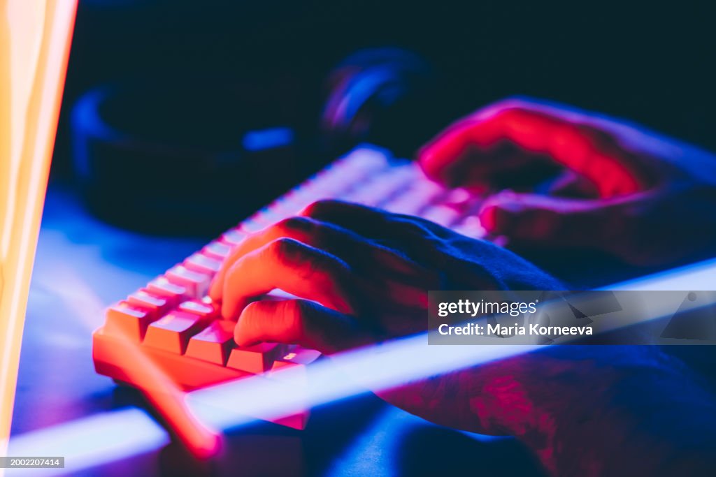 Someone Using A Keyboard Hand Using Rgb Keyboard High-Res Stock Photo - Getty Images