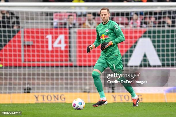 Goalkeeper Peter Gulacsi of RB Leipzig controls the Ball during the Bundesliga match between FC Augsburg and RB Leipzig at WWK-Arena on February 10,...