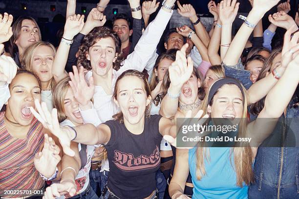 large group of teenagers at club, portrait - teenage girl club stock-fotos und bilder