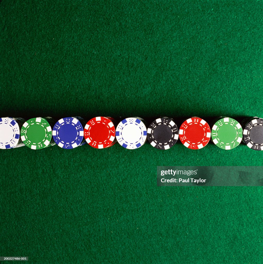 Poker chips lined up on casino table