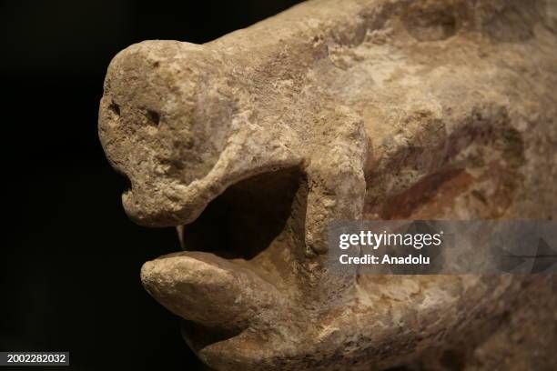 Life-size wild boar statue made of limestone found in the 'D structure' at Gobeklitepe, ancient site famed as 'zero-point of history', is seen at the...