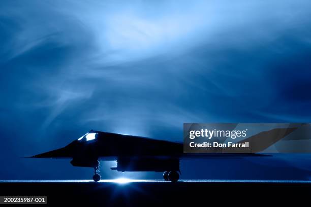stealth f-117 bomber, side view - stealth f 117 stock pictures, royalty-free photos & images