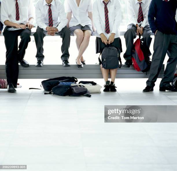 six schoolchildren (14-16) relaxing by window - teenagers only stock pictures, royalty-free photos & images