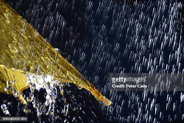 umbrella and rain - torrential rain stock pictures, royalty-free photos & images
