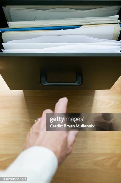 Reaching Hand File Reaching Across Desk Photos and Premium High Res Pictures - Getty Images