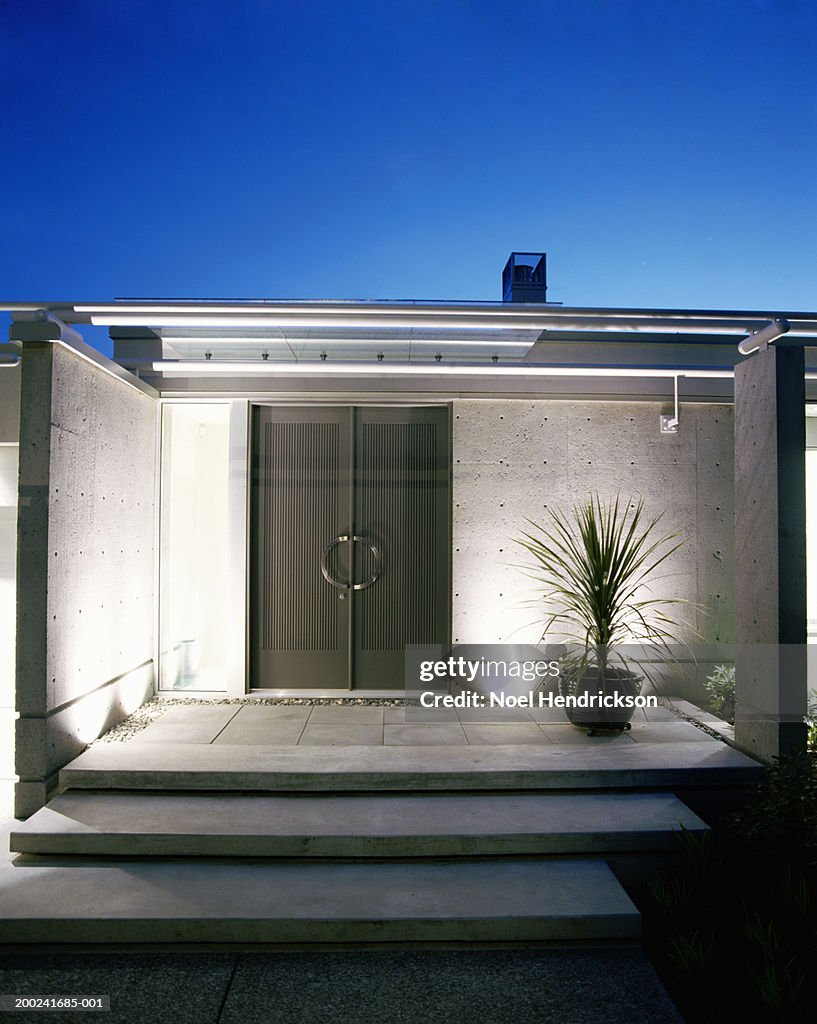 Entrance to modern house, exterior, night