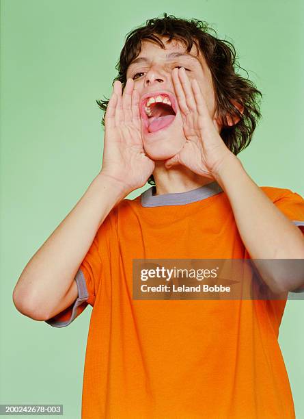 boy (10-12) yelling - boy 10 11 stock pictures, royalty-free photos & images