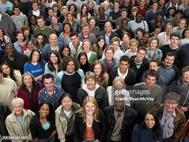 large crowd of people looking up, smiling, portrait, elevated view - large group of people stock pictures, royalty-free photos & images