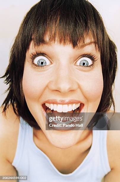 young woman smiling, portrait, close-up - ecstatic face stock pictures, royalty-free photos & images