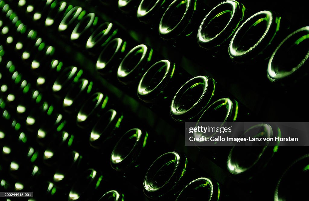 Stacked wine bottles, full frame