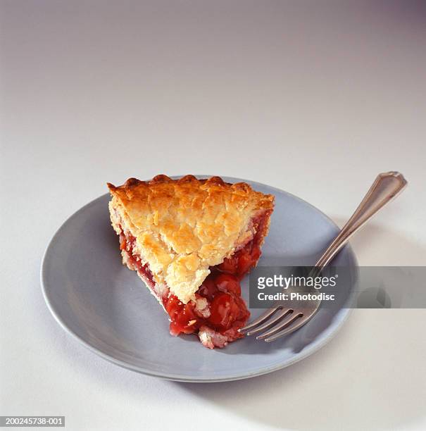 piece of cherry pie on plate with fork, elevated view, (close-up) - cherry pie stock pictures, royalty-free photos & images