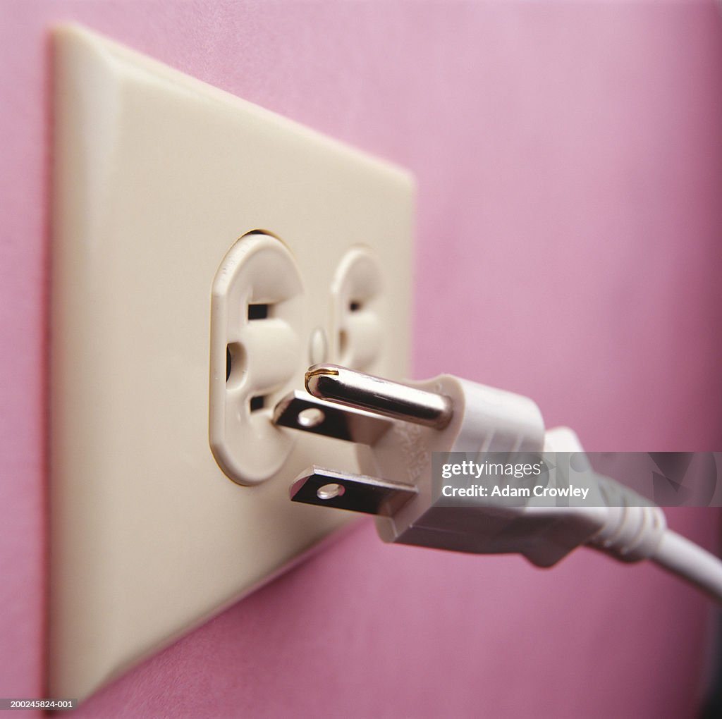 Plug and electrical outlet, (Close-up)