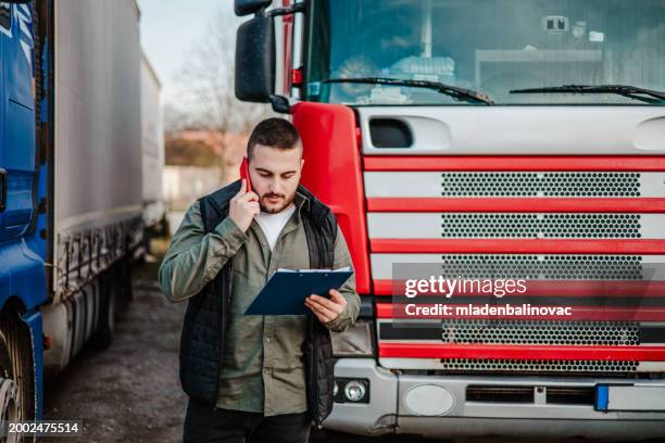 professional truck driver at work - car transporter stock pictures, royalty-free photos & images