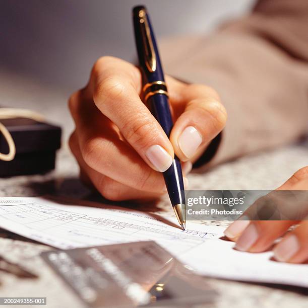 Signimg 697 Signing Receipt Stock Photos, High-Res Pictures, and Images - Getty ...
