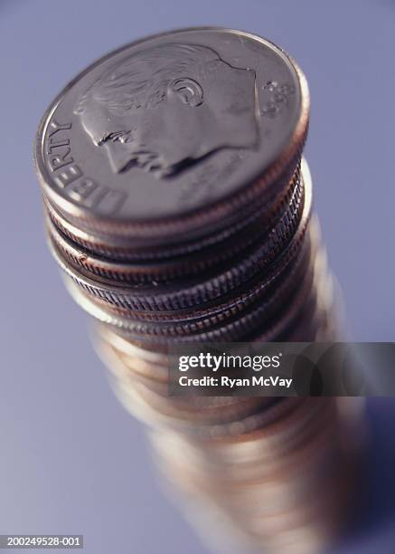 stack of coins, (close-up) - moeda de dez cents - fotografias e filmes do acervo