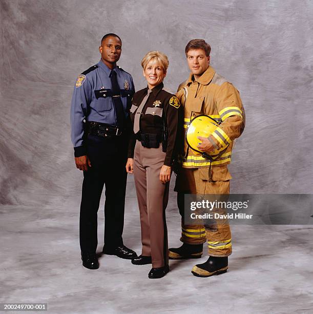 police officer, fire-fighter and sheriff, (portrait) - emergency services occupation stock pictures, royalty-free photos & images