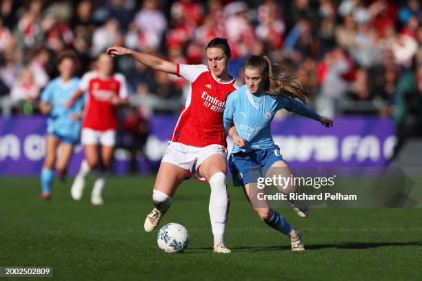 Lotte Wubben-Moy of Arsenal battles for possession with Jess Park of Manchester City during the Adobe Women's FA Cup Fifth Round match between...