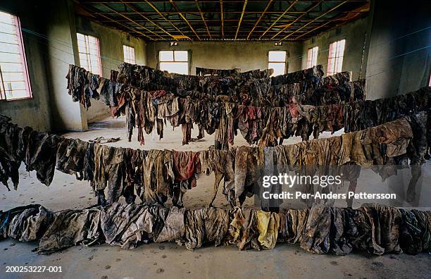 Clothes and belongings from victims of Genocide on display at Murambi memorial site on February 23, 2003 in Murambi outside Gikongoro, Rwanda. About...