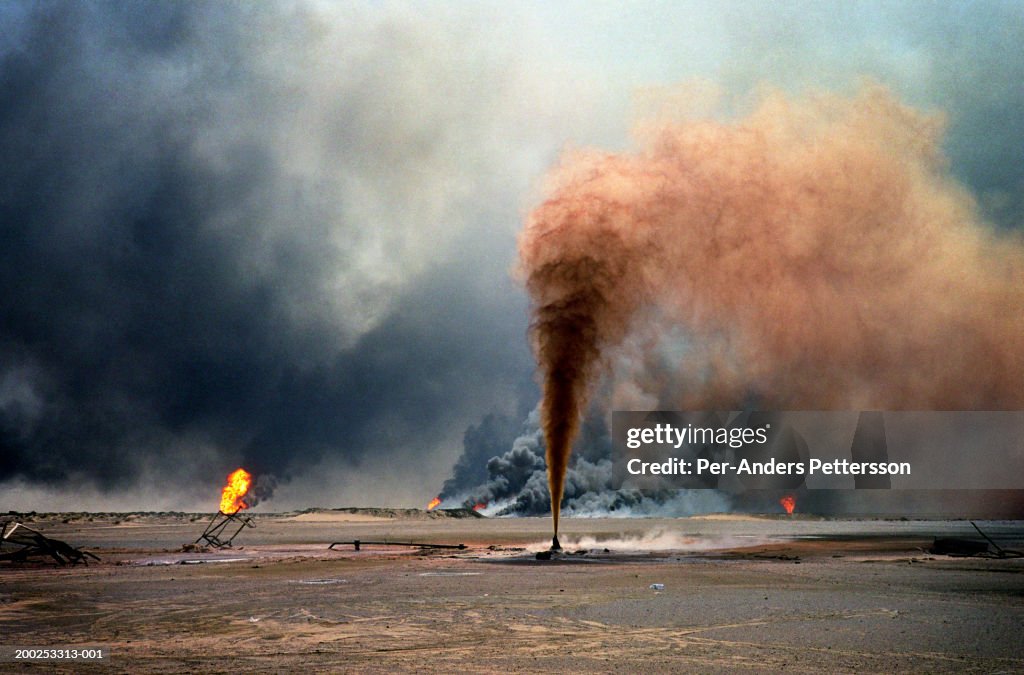 Oil wells burn out of control at Burham oilfield, Kuwait