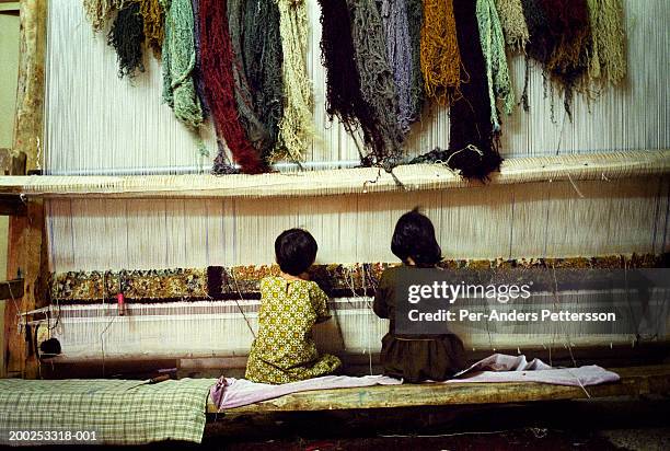 children work in carpet factory attock, pakistan - child labour stock pictures, royalty-free photos & images