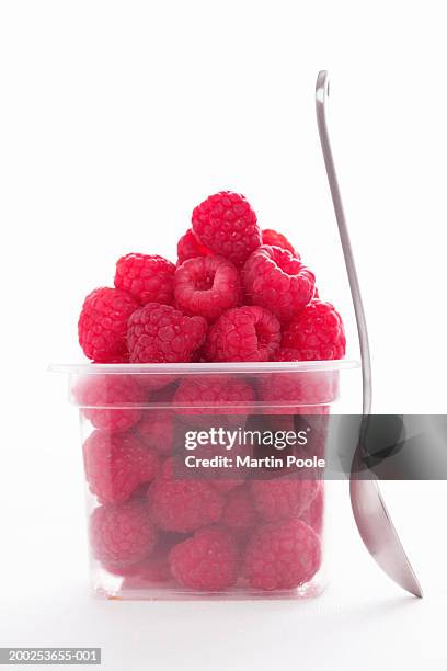 Single Layer Raspberry Punnet Punnet Of Raspberries By Spoon Closeup High-Res Stock Photo - Getty Images