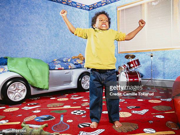 boy (4-6) posing in bedroom, portrait - tantrum stock pictures, royalty-free photos & images
