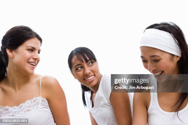 three young women smiling and laughing - キャミソール ストックフォトと画像