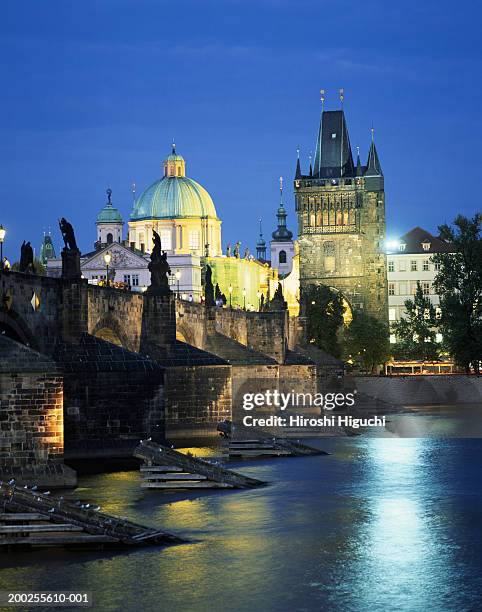 czech republic, prague, charles bridge at night - charles bridge stock pictures, royalty-free photos & images