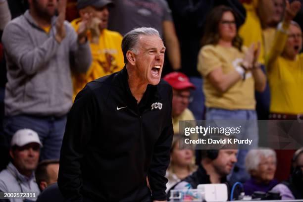 Head coach Jamie Dixon of the TCU Horned Frogs reacts from the bench in the second half of play at Hilton Coliseum on February 10, 2024 in Ames,...