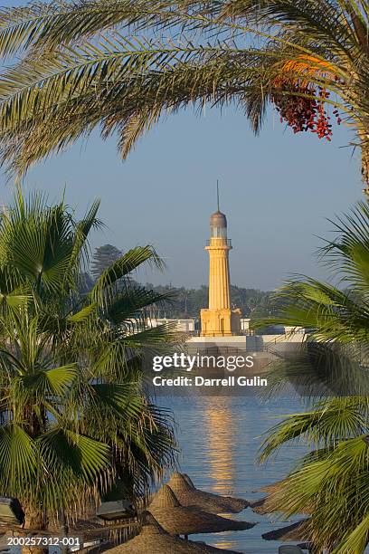 egypt, alexandria, lighthouse in bay - alexandria bay stock pictures, royalty-free photos & images