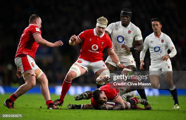 Sam Underhill of England is hit in the face by the boot of Alex Mann of Wales during the Guinness Six Nations 2024 match between England and Wales at...