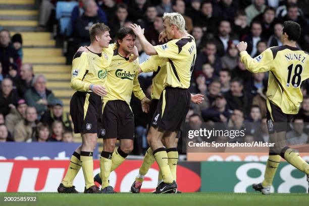 Harry Kewell of Liverpool and Sami Hyypia of Liverpool celebrate during the Premier League match between Aston Villa and Liverpool at Villa Park on...