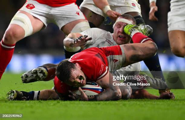 Sam Underhill of England is hit in the face by the boot of Alex Mann of Wales during the Guinness Six Nations 2024 match between England and Wales at...