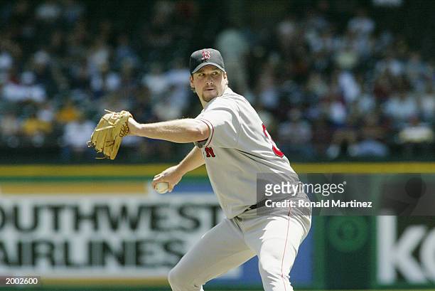 Derek Lowe of the Boston Red Sox throws a pitch during the game against the Texas Rangers at the Ballpark in Arlington on April 24, 2003 in...