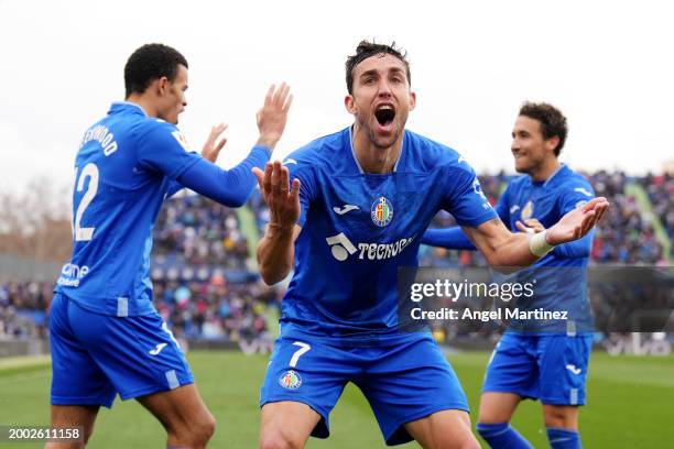 Jaime Mata of Getafe CF celebrates scoring his team's second goal during the LaLiga EA Sports match between Getafe CF and Celta Vigo at Coliseum...