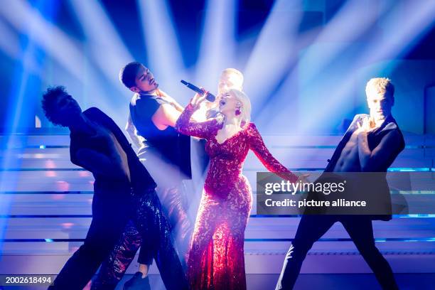 February 2024, Berlin: Marie Reim performs "Naiv" at the rehearsal for the "Eurovision Song Contest - The German Final 2024". Who will represent...