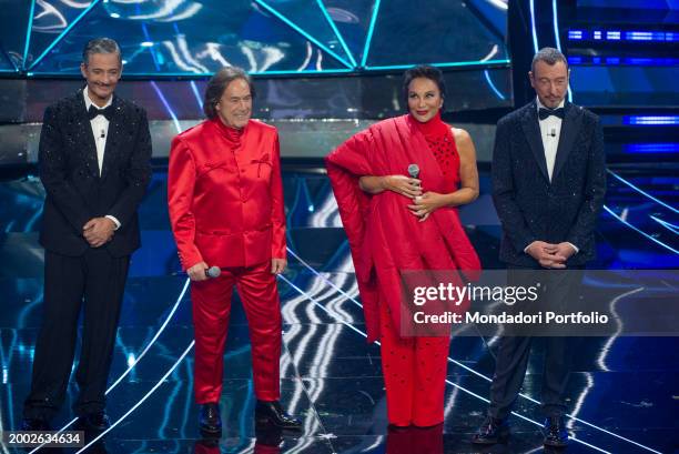 Italian Tv host Fiorello, Italian singers Angelo Sotgiu and Angela Brambati of Ricchi e Poveri and Italian TV host Amadeus at 74 Sanremo Music...