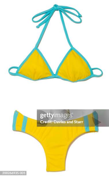 yellow bikini - bikinioberteil stock-fotos und bilder