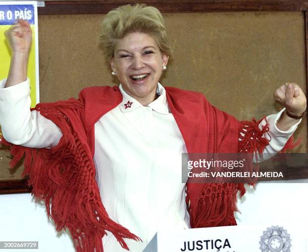 Marta Suplicy, candidate for mayor of the city of Sao Paulo for the leftist worker's party, celebrates after voting electronically in the municipal...