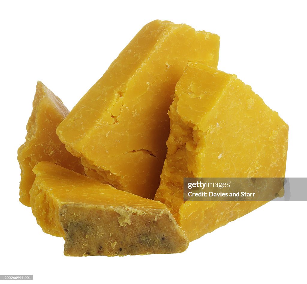 Wedges of cheddar cheese