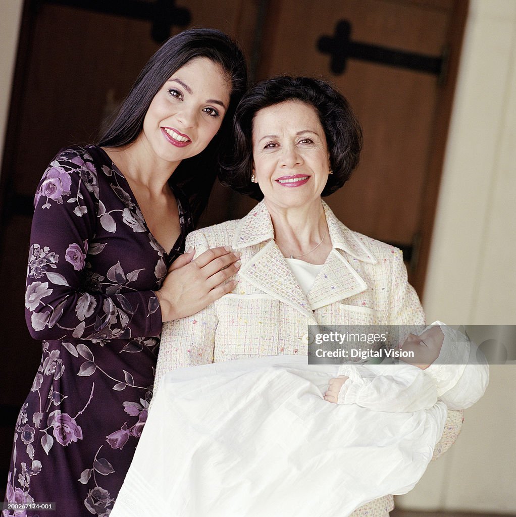 Senior woman and adult daughter with baby boy (0-3 months), portrait