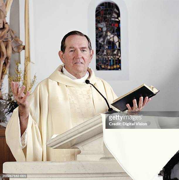 senior priest giving sermon, portrait - preacher stock pictures, royalty-free photos & images