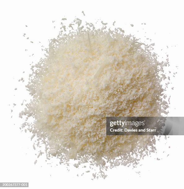 grated reggio parmigiano cheese - grated stock pictures, royalty-free photos & images