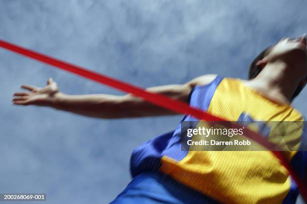 Crossing Finish Line Tape Photos and Premium High Res Pictures - Getty ...