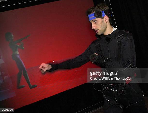 University of Pennsylvania student Aaron Bloomfield, along with an image of himself created into a character called Jill, demonstrates the LiveActor...