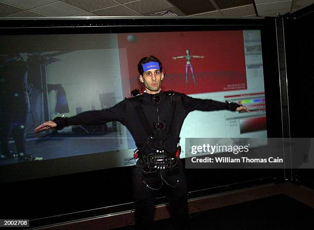 University of Pennsylvania student Aaron Bloomfield, along with an image of himself created into a character called Jill, demonstrates the LiveActor...