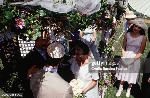 jewish wedding ceremony in garden, elevated view - jewish wedding ceremony stock pictures, royalty-free photos & images